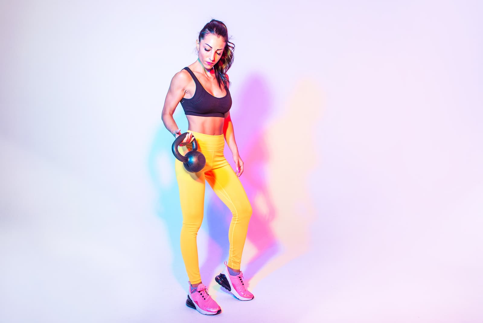Trainee on dumbbell work in the studio.
