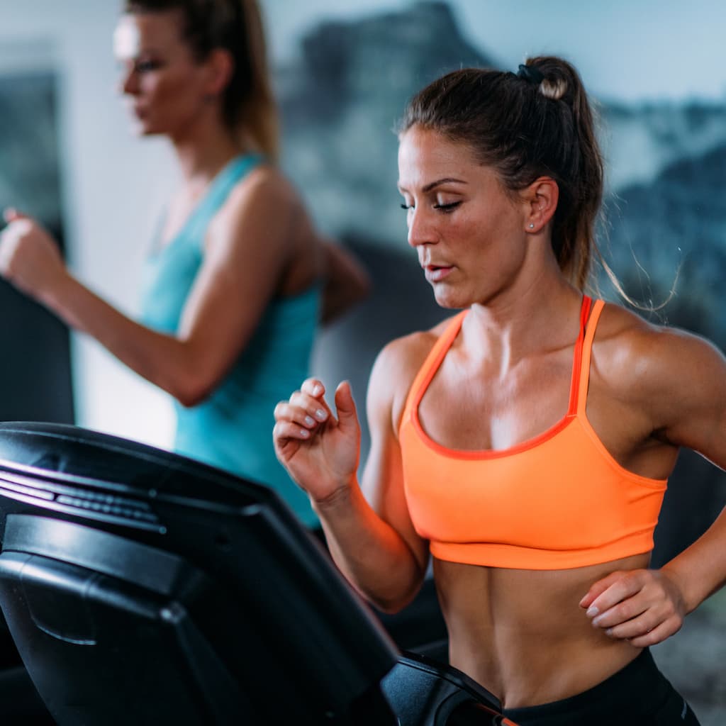 Athletes on treadmills, parallel sessions.